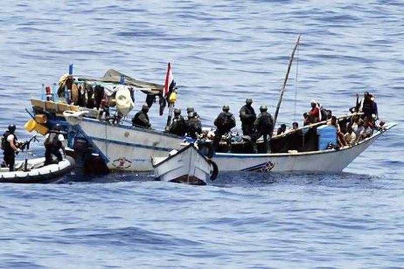 Dutch marines board a Yemeni fishing boat in the Gulf of Aden, which had been captured by Somali pirates. The world's navies are taking a more proactive role in tackling piracy in the region. AP Photo / Defense Ministry Netherlands