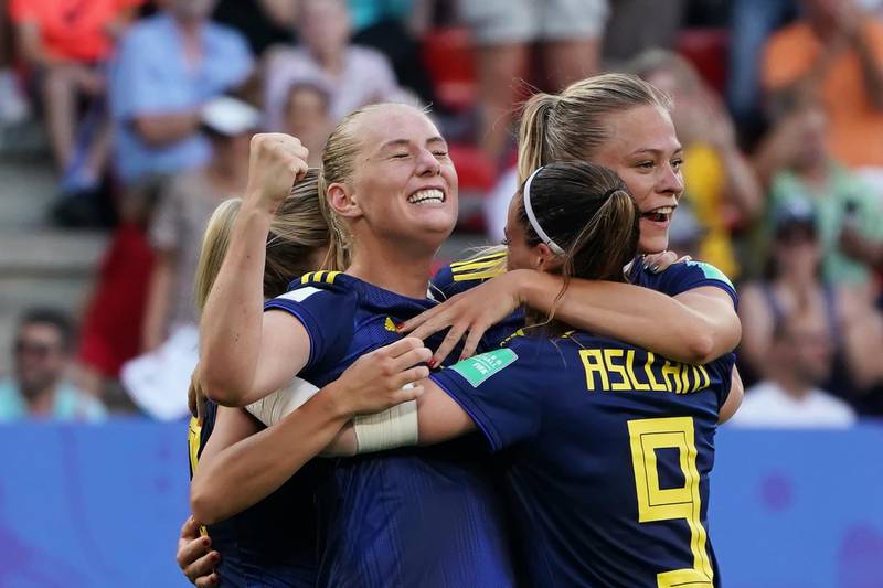 epa07683546 Stina Blackstenius of Sweden celebrates with teammate after scoring a goal during the Quarter Final match between Germany and Sweden at the FIFA Women's World Cup 2019 in Rennes, France, 29 June 2019.  EPA/EDDY LEMAISTRE