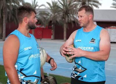 Dubai Sharks forwards coach Josh Ives, left, with Dylan Hartley. Victor Besa / The National