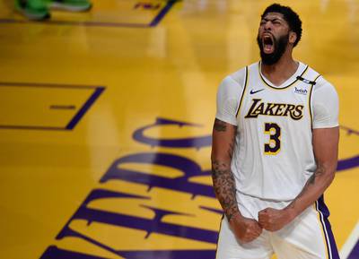 May 9, 2021; Los Angeles, California, USA; Los Angeles Lakers forward Anthony Davis (3) reacts after a dunk during the second half against the Phoenix Suns at Staples Center. Mandatory Credit: Kelvin Kuo-USA TODAY Sports