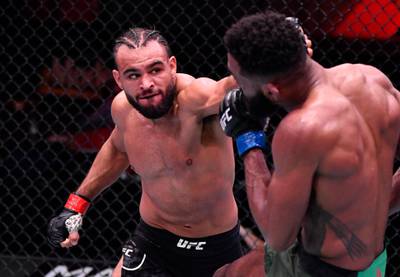 LAS VEGAS, NEVADA - FEBRUARY 13: (L-R) Gabe Green punches Phil Rowe in their welterweight fight during the UFC 258 event at UFC APEX on February 13, 2021 in Las Vegas, Nevada. (Photo by Jeff Bottari/Zuffa LLC) *** Local Caption *** LAS VEGAS, NEVADA - FEBRUARY 13: (L-R) Gabe Green punches Phil Rowe in their welterweight fight during the UFC 258 event at UFC APEX on February 13, 2021 in Las Vegas, Nevada. (Photo by Jeff Bottari/Zuffa LLC)
