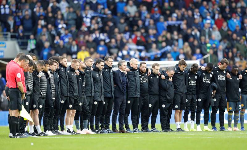 Cardiff City v Leicester City - Cardiff City Stadium, Cardiff, Britain -  Leicester City players and staff during a minutes silence as part of remembrance commemorations and for Vichai Srivaddhanaprabha, late chairman of Leicester City Football Club, before the match. Reuters