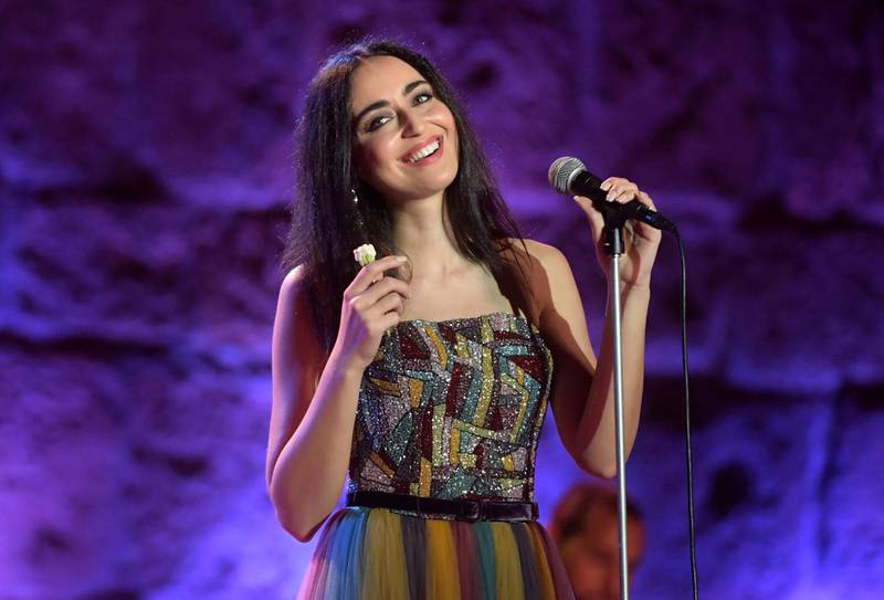 Syrian singer Faia Younan performs at the Roman theaterthe during the International Carthage Festival in the ancient city of the same name, just outside the Tunisian capital Tunis, late  on July 18, 2019. (Photo by FETHI BELAID / AFP)