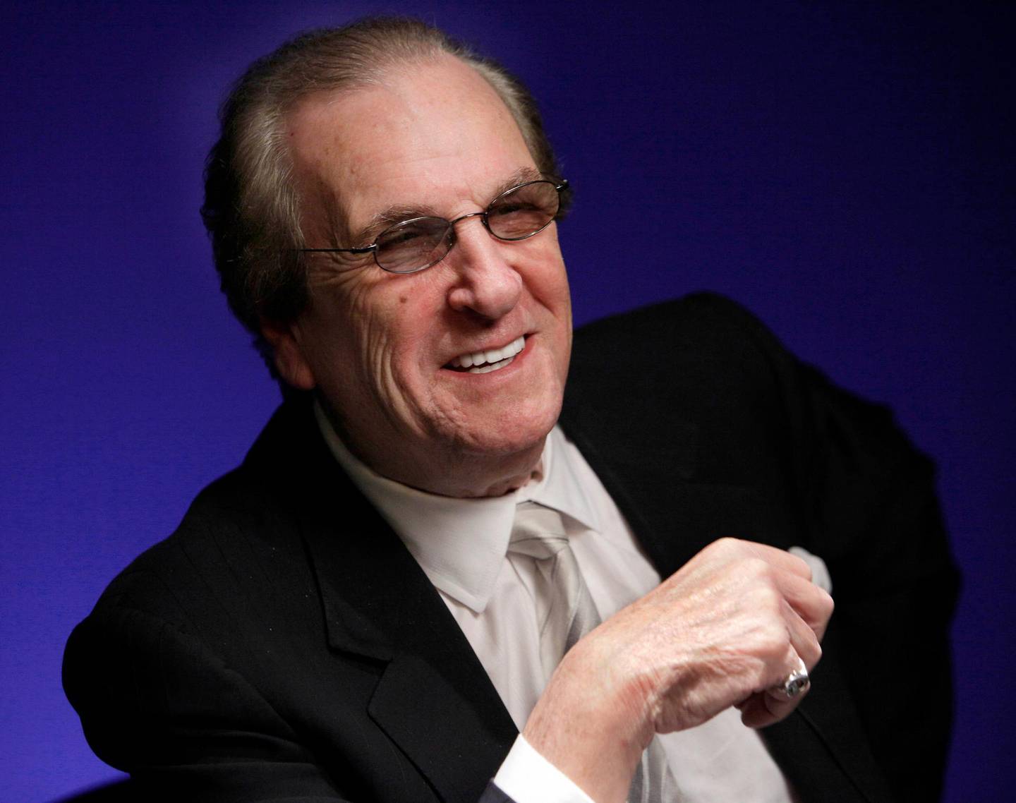 FILE - In this Friday, Oct. 7, 2011, file photo, actor Danny Aiello smiles while being photographed in New York. Aiello, the blue-collar character actor whose long career playing tough guys included roles in â€œFort Apache, the Bronx,â€  "The Godfather, Part II," â€œOnce Upon a Time in Americaâ€ and his Oscar-nominated performance as a pizza man in Spike Leeâ€™s "Do the Right Thing," has died. He was 86. Aiello died Thursday, Dec. 12, 2019 after a brief illness, said his publicist, Tracey Miller.  (AP Photo/Richard Drew, File)
