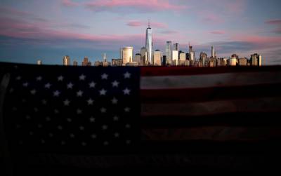 An American flag is seen in front of the Manhattan skyline in New York City. AFP