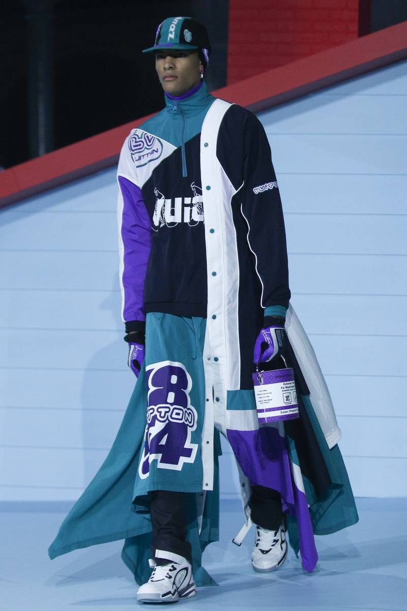 Abloh created a coat from a deconstructed track suit jacket. EPA
