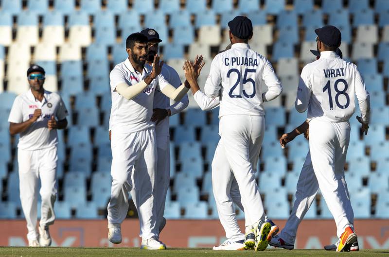 India bowler Jasprit Bumrah, second left, celebrates with teammates after taking the wicket of South Africa's Rassie van der Dussen during Day 4 of the first Test at SuperSport Park in Centurion on Wednesday, December 29. AP