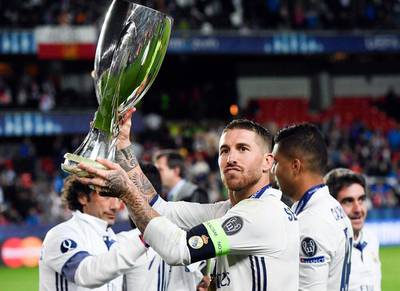 Real Madrid's Sergio Ramos celebrates with the trophy after winning the Uefa Super Cup on Tuesday night. Jonathan Nackstrand / AFP / August 9, 2016