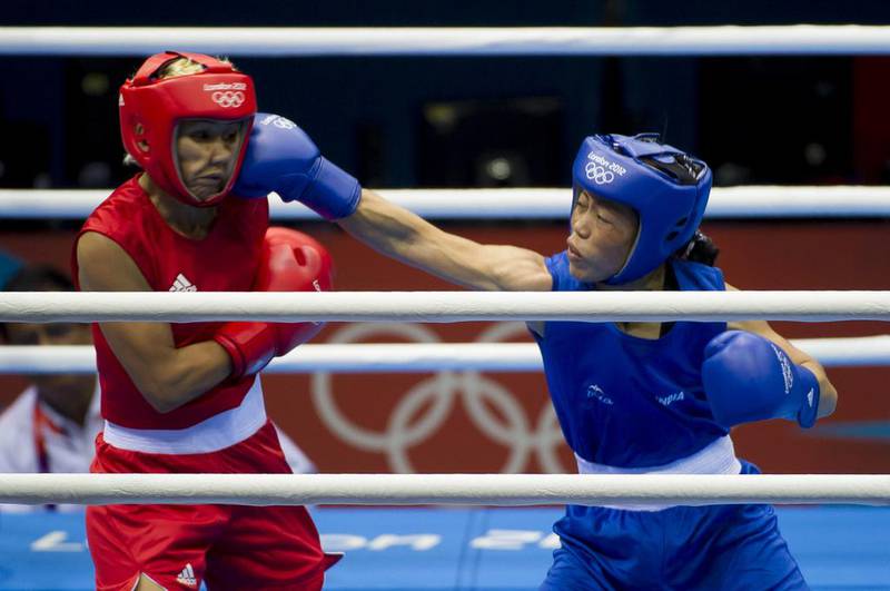 Mary Kom, left, competes against Maroua Rahali of Tunisia during the flyweight quarter-finals at the 2012 London Olympic Games.