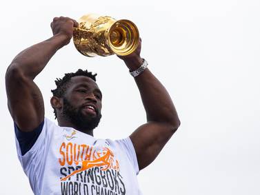 Springboks captain Siya Kolisi parades Rugby World Cup in township where he first picked up a ball - in pictures