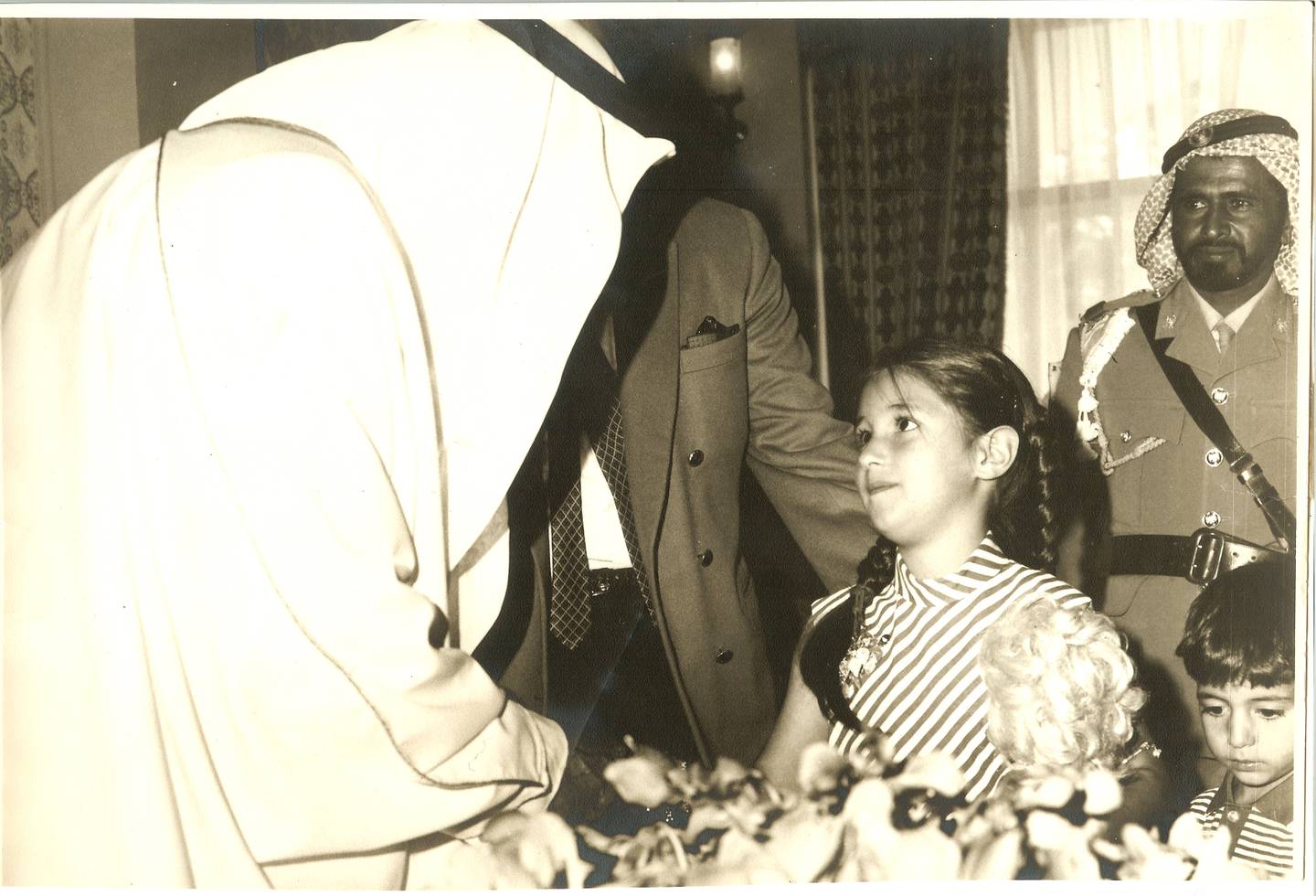 Reem, 5, with Sheikh Zayed, who founded the UAE in 1971. She describes the feelings of joy and privilege at having been immersed in the UAE's history from such an early age. Photo: Dr Reem El Mutwalli