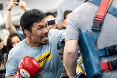 epa07708982 Filipino Senator and professional boxer Manny Pacquiao (L) trains at the Wild Card Boxing gym in Los Angeles, California, USA, 10 July 2019. Pacquiao will fight Keith Thurman on 20 July in Las Vegas. EPA/ETIENNE LAURENT