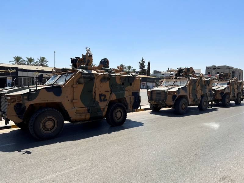 Military vehicles of the 444 Brigade, backing the Government of National Unity patrol the streets. Reuters