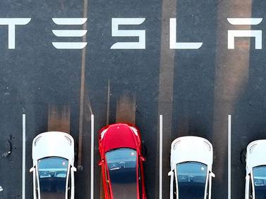 Tesla's stock dips after earnings call despite 20% profit jump and record deliveries