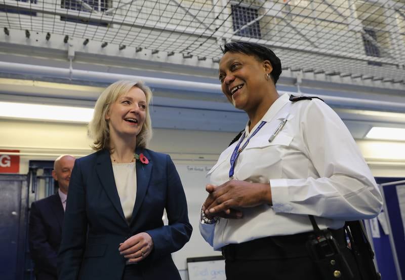 Liz Truss is escorted around HMP Brixton in November 2016, while serving as Justice Secretary. Getty Images