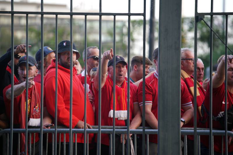 Liverpool fans queue to gain entry to the stadium as Kick off is delayed ahead of the UEFA Champions League Final at the Stade de France, Paris. Picture date: Saturday May 28, 2022.