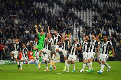 Juventus players celebrate after their win. Mike Hewitt / Getty Images