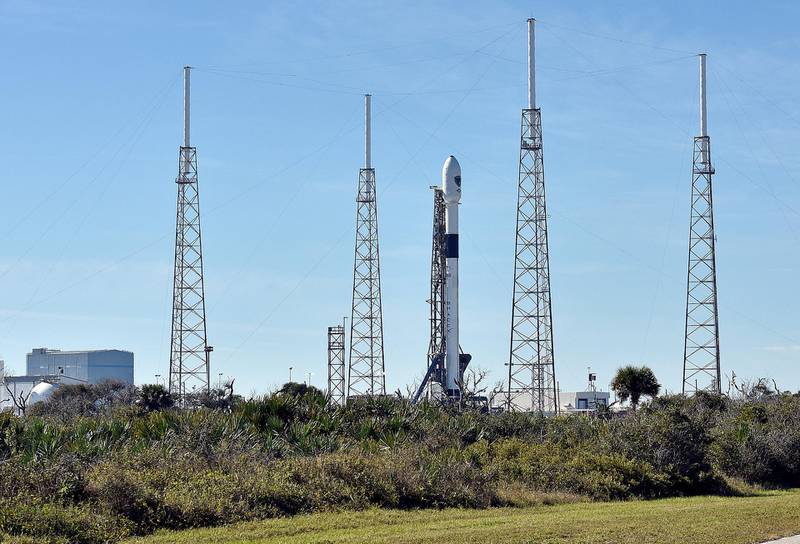 FILE PHOTO: The SpaceX Falcon 9 rocket, scheduled to launch a U.S. Air Force navigation satellite, sits on Launch Complex 40 after the launch was postponed after an abort procedure was triggered by the onboard flight computer, at Cape Canaveral, Florida, U.S., December 18, 2018. REUTERS/Steve Nesius/File Photo