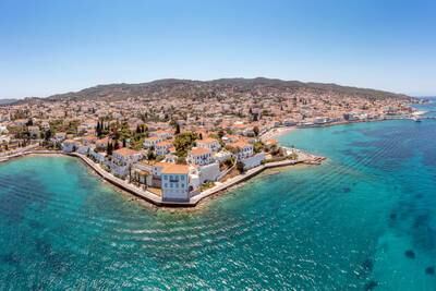 The writer's aerial adventure begins on the Greek island of Spetses, pictured here. Getty Images