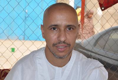 Mohamedou Ould Slahi, a Guantanamo Bay prisoner who wrote a best-selling book about his experiences in the military prison, poses on October 18, 2016 in Nouakchott, after he was reunited with his family in his native Mauritania on October 17 after 14 years of detention - The transfer of Mohamedou Ould Slahi, believed to be the last inmate from Mauritania held at the facility in Cuba, brings the prison's remaining population down to 60. His case became a cause celebre after the publication last year of "Guantanamo Diary", in which he outlines his treatment at the notorious US naval base in Cuba and says he was subjected to torture. (Photo by STRINGER / AFP)