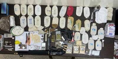 Drugs and weapons seized in anti-narcotics operations in Jordan. Photo: General Security Directorate