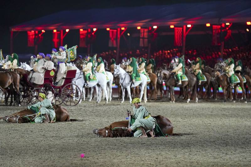 The traditional display included a group of horses who laid down midway through the performance in an impressive move alongside their trainers.