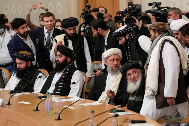 Members of the Taliban delegation, icluding deputy prime minister Abdul Salam Hanafi (C), attend an international conference on Afghanistan in Moscow on October 20, 2021. AFP