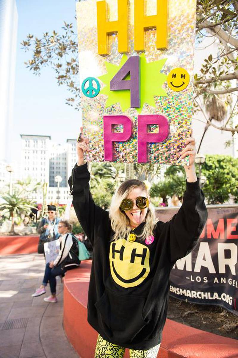 Singer Miley Cyrus attends the women’s march in Los Angeles. Emma McIntyre / Getty Images / AFP