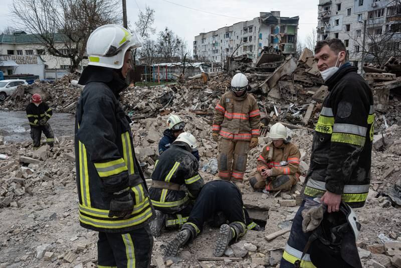 Rescue workers clear the rubble of an apartment building in Borodianka. Getty Images