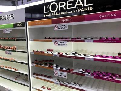 Empty shelves are seen where French products were displayed, after Kuwaiti supermarkets boycotted French goods, in Kuwait City. Reuters