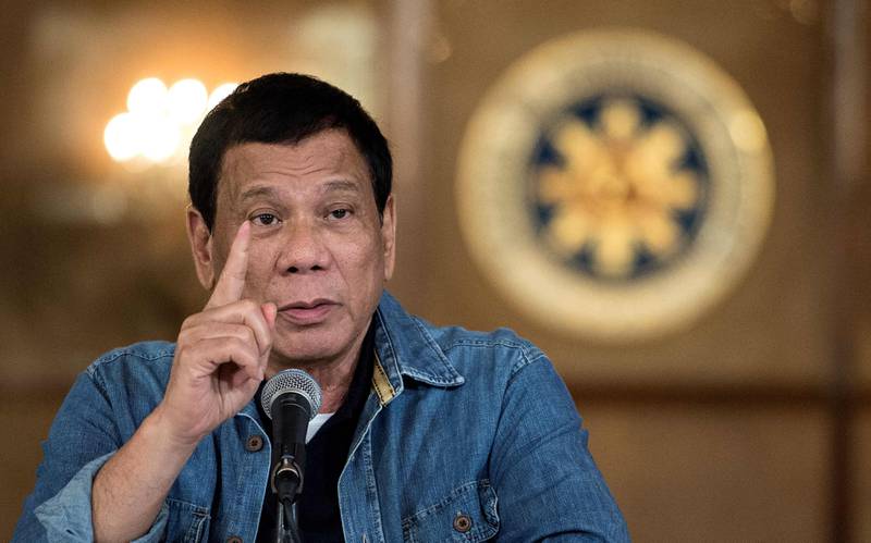 Philippine's President Rodrigo Duterte gesturing as he answers a question during a press conference at the Malacanang palace in Manila. AFP