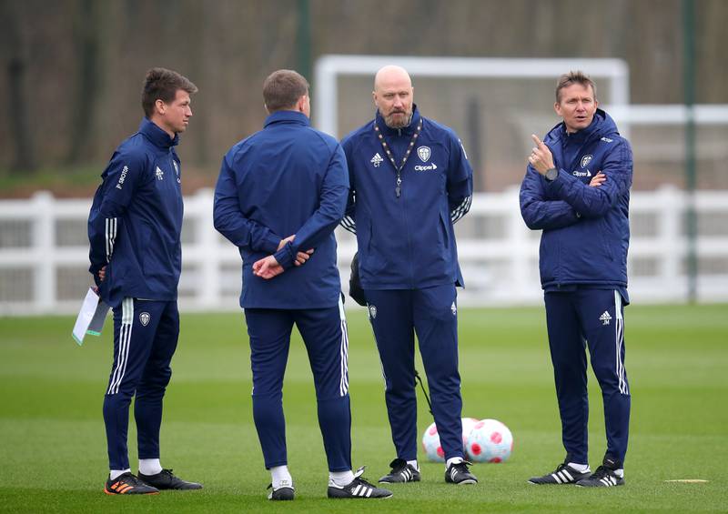 New Leeds manager Jesse Marsch, right, assistant manager Cameron Toshack, second right, and coach Franz Schiemer, left, during a training session. PA