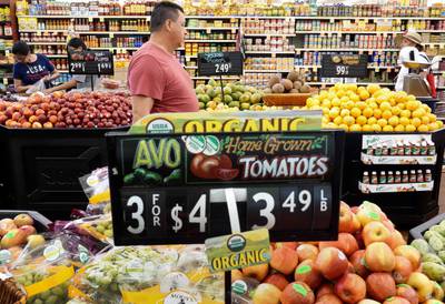 Prices of goods and services increased at a slower rate in October in the US. AFP