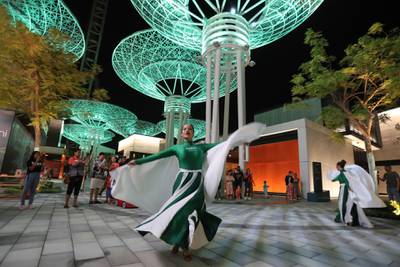 Women in Saudi National flag colours perform during Saudi National Day celebrations at the Bluewaters Island in Dubai, United Arab Emirates. AP Photo