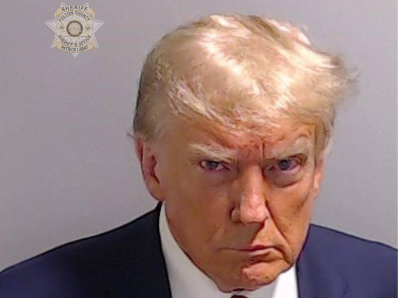 Former US president Donald Trump's booking photo after he surrendered to charges in Georgia. Reuters