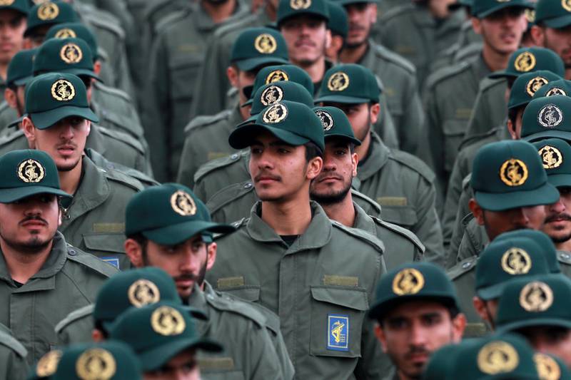 FILE - In this Feb. 11, 2019 file photo, Iranian Revolutionary Guard members attend a ceremony celebrating the 40th anniversary of the Islamic Revolution, at the Azadi, or Freedom, Square in Tehran, Iran. The Trump administration on Wednesday granted important exemptions to new sanctions on Iranâ€™s Revolutionary Guard, watering down the effects of the measures while also eliminating an aspect that would have complicated U.S. foreign policy efforts.  (AP Photo/Vahid Salemi)