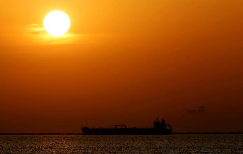 FILE PHOTO: An oil tanker sits anchored off the Fos-Lavera oil hub near Marseille, France, September 17.  REUTERS/Jean-Paul Pelissier/File Photo