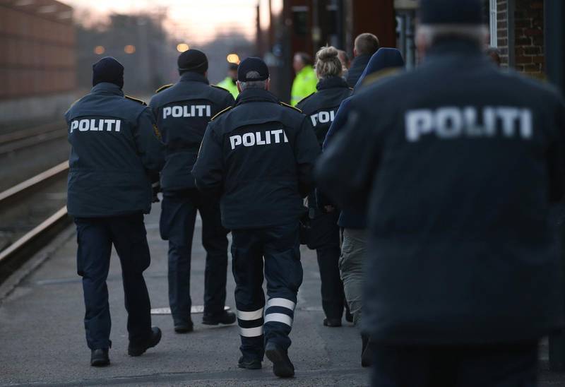 PADBORG, DENMARK - JANUARY 06:  Danish police prepare to board a train arriving from Germany in order to check the identity papers of passengers on January 6, 2016 in Padborg, Denmark. Denmark introduced a 10-day period of passport controls and spot checks on Monday on its border to Germany in an effort to stem the arrival of refugees and migrants seeking to pass through Denmark on their way to Sweden. Denmark reacted to border controls introduced by Sweden the same day and is seeking to avoid a backlog of migrants accumulating in Denmark. Refugees still have the right to apply for asylum in Denmark and those caught without a valid passport or visa who do not apply for asylum are sent back to Germany.  (Photo by Sean Gallup/Getty Images)