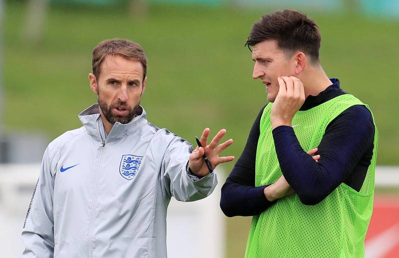 File photo dated 04-09-2018 of England manager Gareth Southgate and Harry Maguire. PA Photo. Issue date: Tuesday August 25, 2020. Harry Maguire has been named in Gareth Southgate’s England squad for next month’s Nations League games against Iceland and Denmark, while there are first call-ups for Phil Foden, Mason Greenwood and Kalvin Phillips, the Football Association has announced. See PA story SOCCER England. Photo credit should read Mike Egerton/PA Wire.