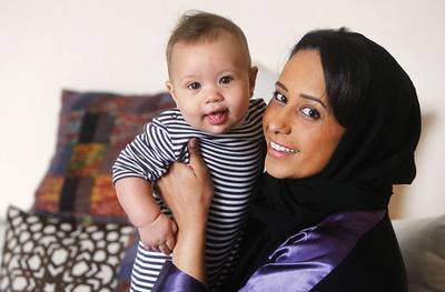 Khawla Saleh, with seven-month-old son Adam, said the course allowed her to better appreciate her children’s development and equipped her with an insight into ‘fatherly fathering’ to share and a better grasp of emotional intelligence. Delores Johnson / The National