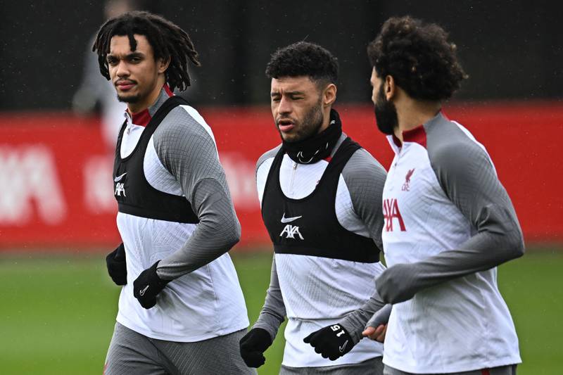 From left: Trent Alexander-Arnold, Alex Oxlade-Chamberlain and Mohamed Salah train. AFP