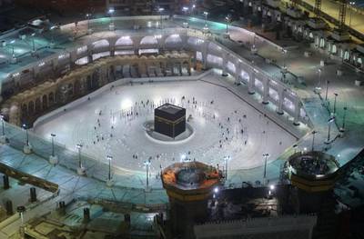Saudis and foreign residents circumambulate (Tawaf) the Kaaba in the Grand Mosque complex in the holy city of Makkah, as authorities partially resume the year-round Umrah for a limited number of pilgrims amid extensive health precautions after a seven-month coronavirus hiatus. AFP