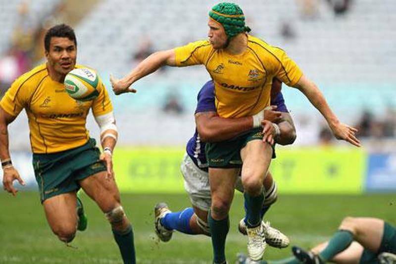 Unless an injury occurs, Matt Giteau, right, is out of Australia's Rugby World Cup plans.