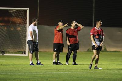 Roelof Kotze, second left, coaches the UAE national rugby team. Sarah Dea / The National