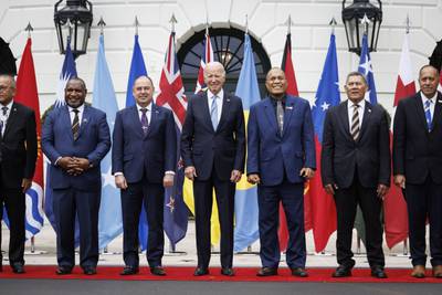 US President Joe Biden poses for a photograph with Pacific Islands Forum leaders at the White House. Bloomberg