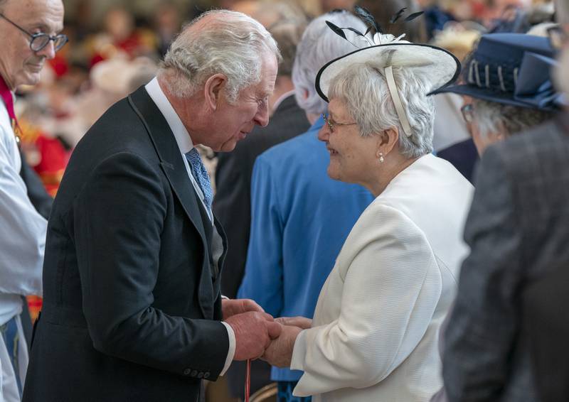 Prince Charles greets guests at the service. PA