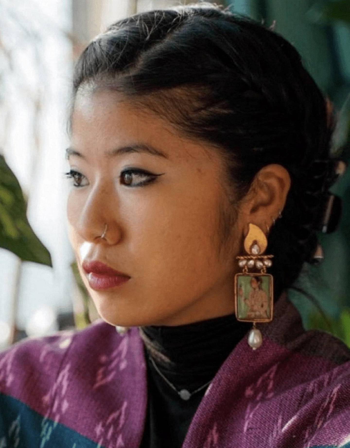 Korean-American documentary-maker Joi Lee sports a pair of Pierre Gemme by Hur earrings dedicated to Umrao Jaan Ada, a courtesan and poet from 19th-century Lucknow. Courtesy Pierre Gemme by Hur