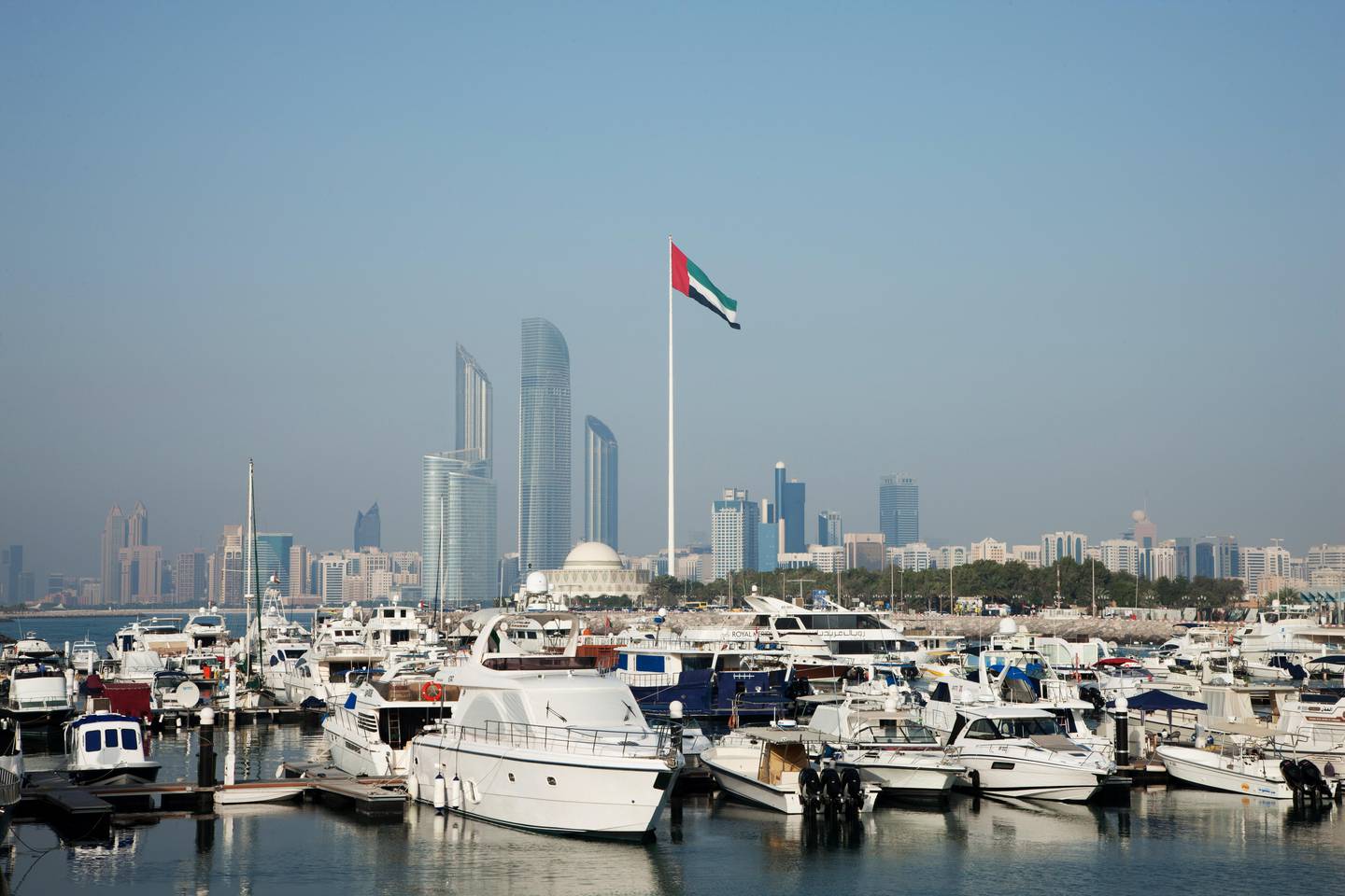 United Arab Emirates, Abu Dhabi, Skyline with harbor in foreground (Getty Images) *** Local Caption ***  al03no-flag-main.jpg
