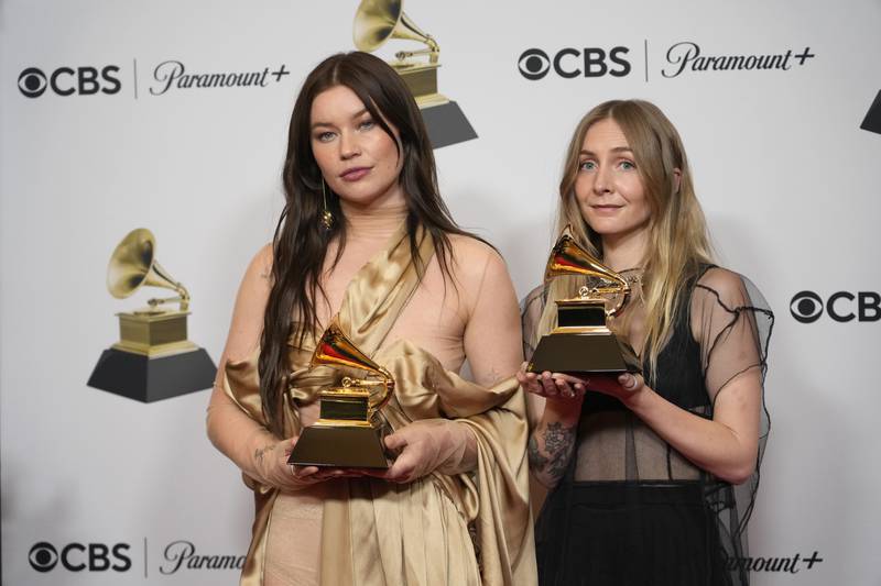Rhian Teasdale, left, and Hester Chambers of Wet Leg with the awards for Best Alternative Music Performance for Chaise Lounge and Best Alternative Music Album for Wet Leg. AP