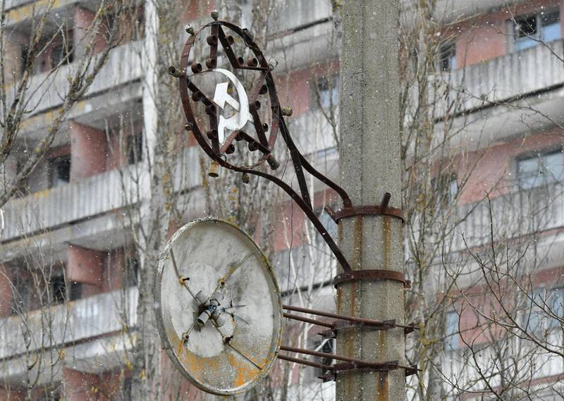 Soviet era symbols on a post in the ghost town of Pripyat, not far from Chernobyl nuclear power plant. AFP